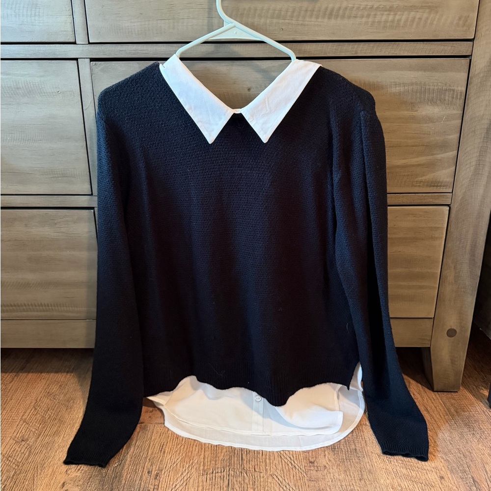 Black sweater with sheer underlayer